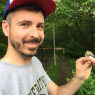 Dr. Scott Taylor with a chestnut-sided warbler